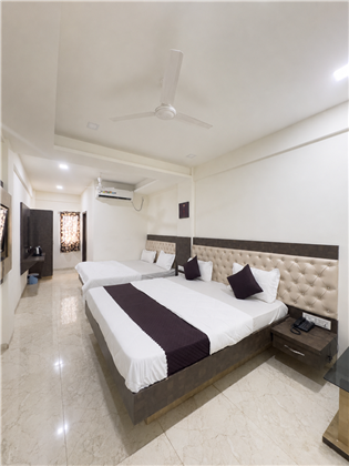 Deluxe Family Room with two double beds